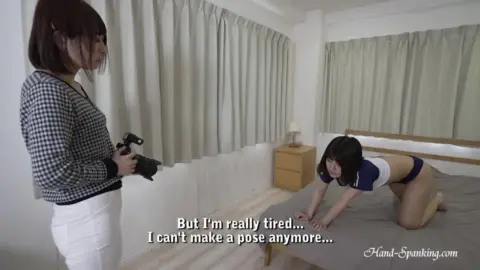 Asian Lesbians Spanking in Bedroom