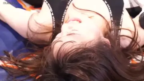 Asian Wrestlers Engage in Intense Matches