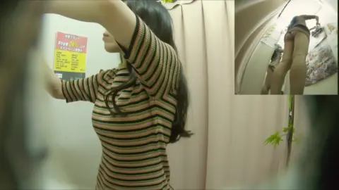 Asian teen undresses in hotel room