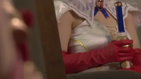 Asian Woman Pleasures Herself with Vibrator