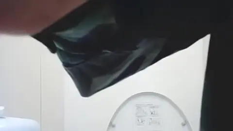 Asian Girl in Bathroom