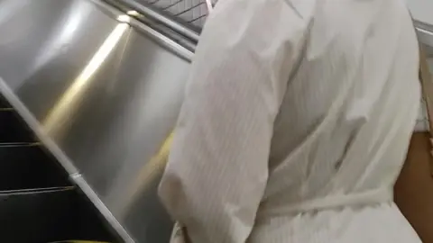 Asian Girl in Subway Station