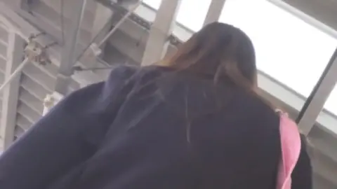 Intimate Moment on Public Transport