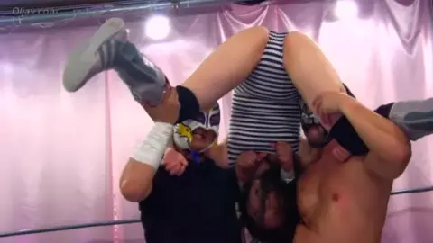 Asian Wrestlers in Wrestling Ring