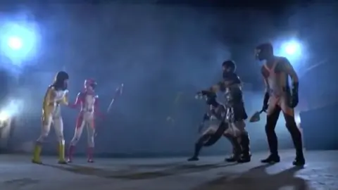 Asian Performers in Costumes on Stage