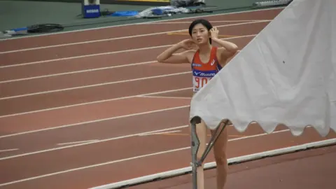 Asian Athletes in Sports Attire