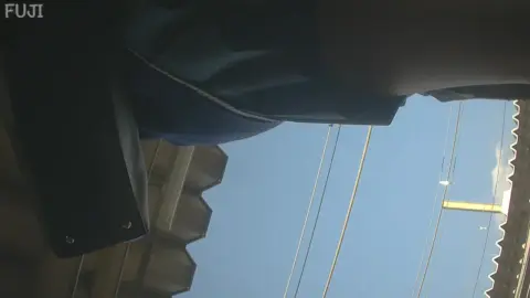 Asian Woman Walking on Street POV