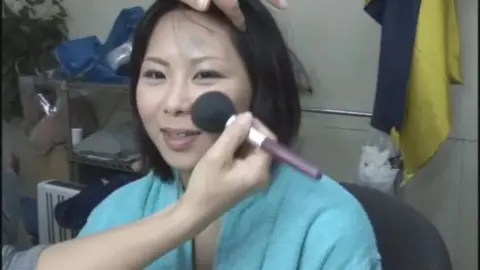 Asian Performer in Blue Costume