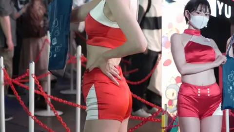 Asian Model in Red Outfit and White Mask Posing