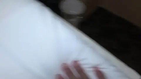 Two Men Engage in Intimate Acts on Couch and Bed