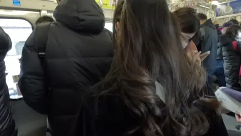 Asian Schoolgirls on Crowded Train