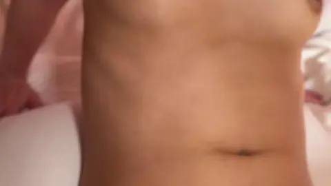 Asian Woman with Tattoos Masturbating on Bed