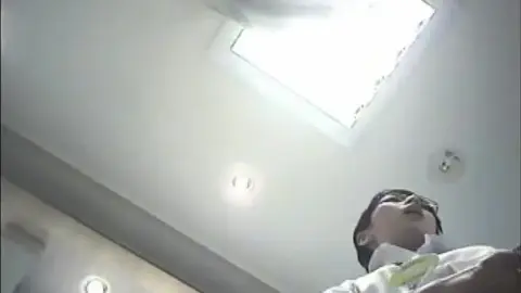 Asian Man in Office and Bathroom Scenes