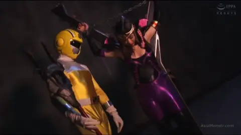 Asian Couple in Bondage Fight Scene