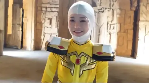 Asian Performer in Fantasy Costume