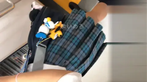 Asian Girl in Plaid Skirt