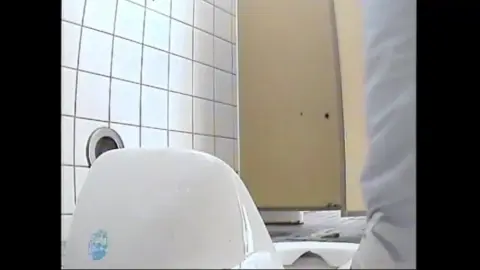 Asian Teen in Bathroom Tease