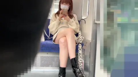 Asian Redhead in White Mask on Train