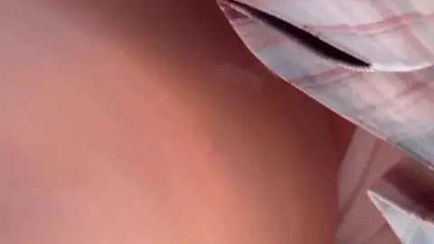 Asian Girl in Plaid Skirt