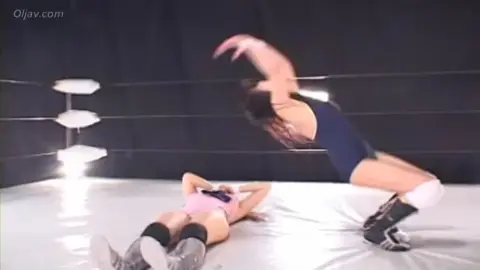 Asian Lesbians in Wrestling Ring