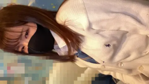 Woman Sitting and Standing, Adjusting Clothing