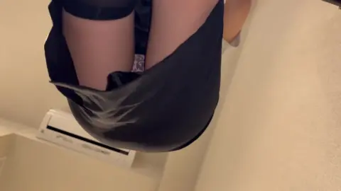 Asian Girl Exposes Underwear in Skirt