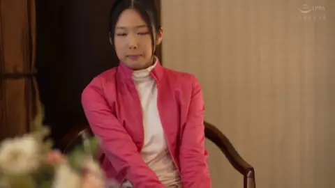 Asian Superheroine in Pink Costume