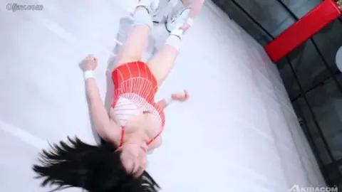Asian Wrestlers in Swimsuits Grapple