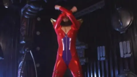 Asian Lesbian Intimacy in Dimly Lit Room