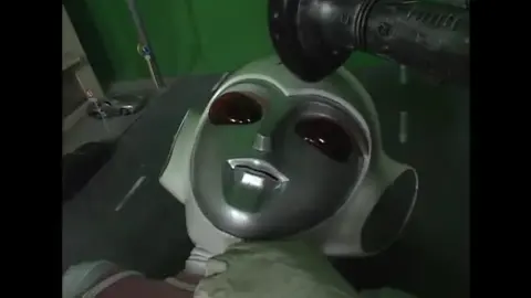 Asian Girl in Fetish Boots and Cosplay