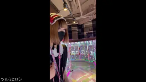 Blonde Asian Woman at Arcade