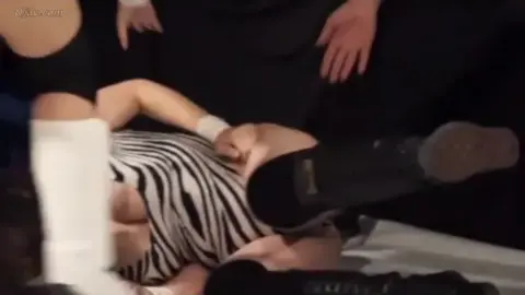 Asian Women Wrestling and Hugging