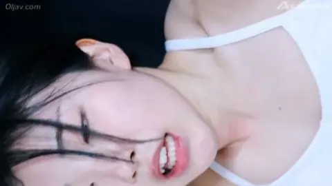 Asian Fighter in Boxing Ring