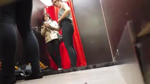 Fitting Room – Threesome Sex Scene