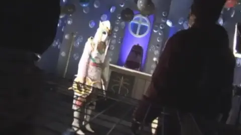 Asian Women in Costumes Dancing on Stage