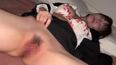 Asian Couple Intimate Moments in Bedroom