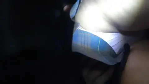 Blonde and Brunette Lovers in Intimate Bedroom Encounter