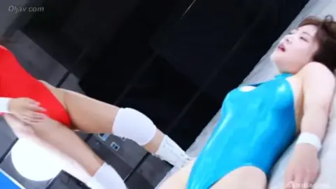 Asian Lesbians Wrestling in Ring