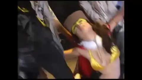 Asian Women in Masks and Capes Engage in Sensual Acts