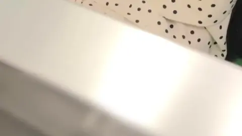 Asian Beauty Gets Ready in Bathroom