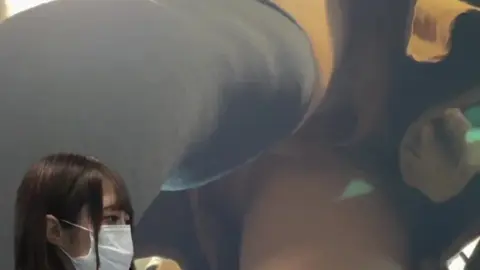 Asian Lesbians in Public Restroom