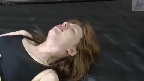 Women Engage in Intense Wrestling Match