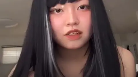 Asian Teen with Black Hair Exposes Herself on Bed