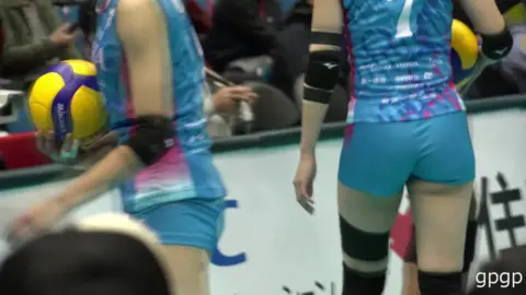 Asian Volleyball Players in Uniform