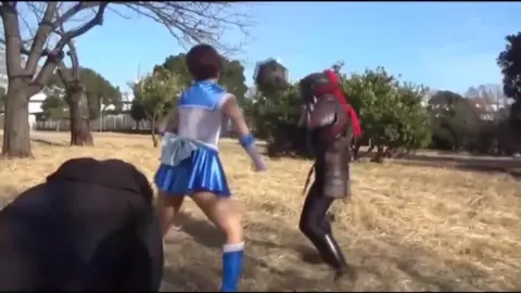 Asian Women in Costume Fighting Outdoor
