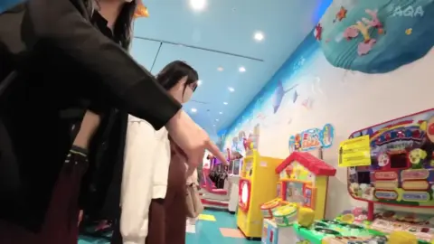 Asian Girls in Lingerie at Mall and Arcade