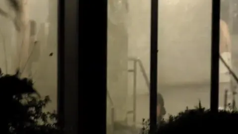 Asian Girls in Dimly Lit Bathroom