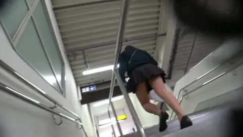 Schoolgirls in Uniform Caught on Hidden Cam