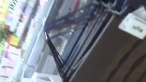 Asian Girl Shopping in Store