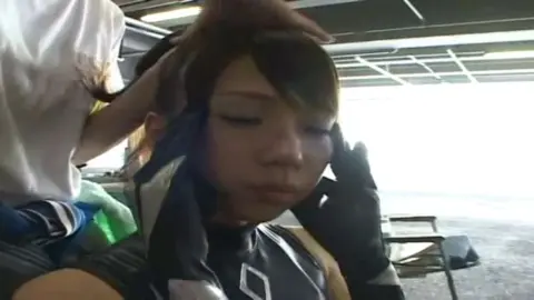 Asian Woman in Leather Costume and Bondage Scenes